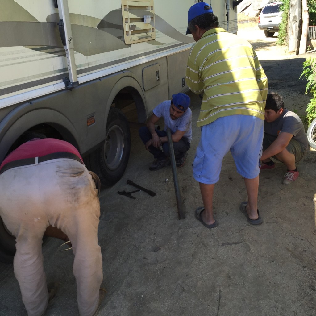 How many guys does it take to change a tire?